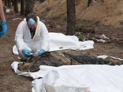 Вбивці і кати, позбавлені всього людського: Зеленський відреагував на масове поховання в Ізюмі