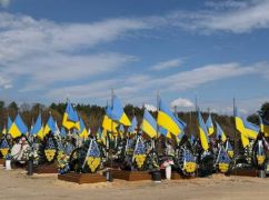 Украл флаг из могилы военного: на Харьковщине мужчину отправили за решетку