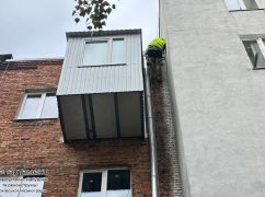 В Киевском районе Харькова восстанавливают дом, пострадавший от вражеских атак